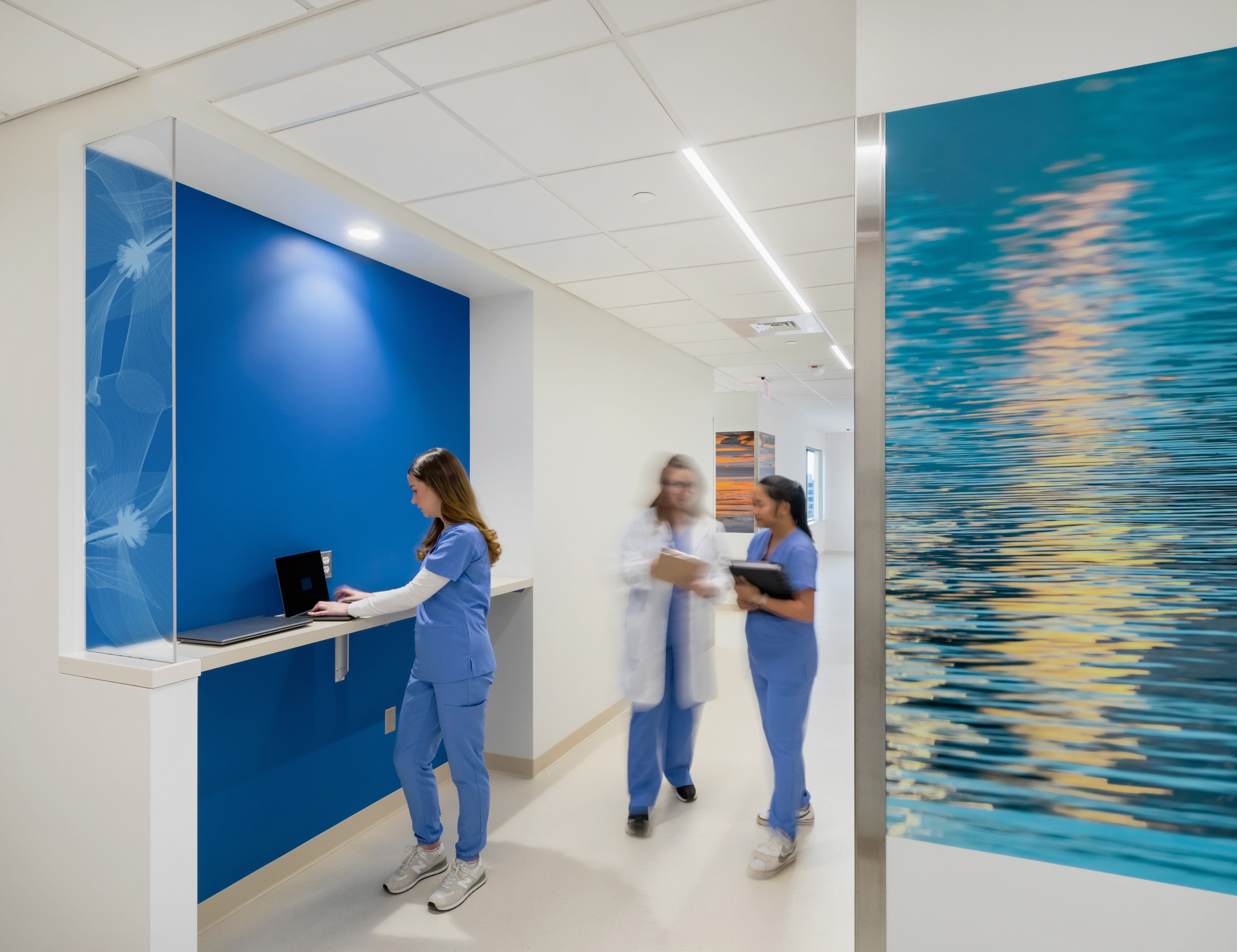 nora by Interface noraplan environcare rubber flooring in hospital corridor and touchdown station